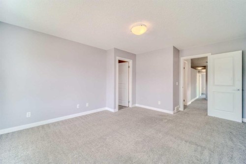 22 Sage Bluff Heights Nw, Calgary, AB - Indoor Photo Showing Other Room