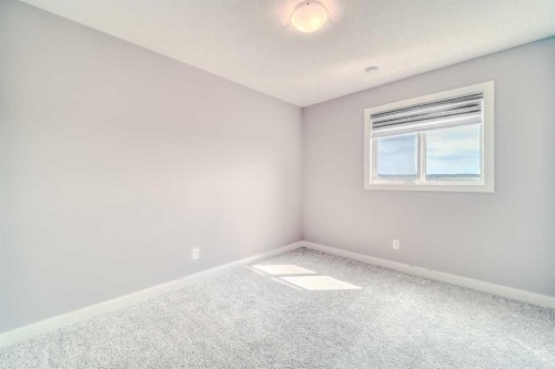 22 Sage Bluff Heights Nw, Calgary, AB - Indoor Photo Showing Other Room