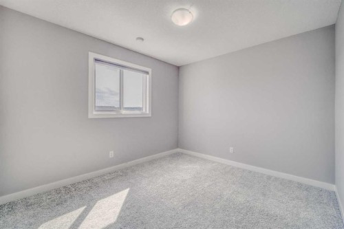 22 Sage Bluff Heights Nw, Calgary, AB - Indoor Photo Showing Other Room