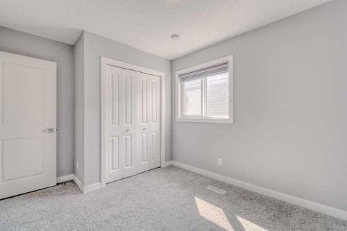 22 Sage Bluff Heights Nw, Calgary, AB - Indoor Photo Showing Other Room