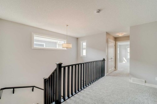 22 Sage Bluff Heights Nw, Calgary, AB - Indoor Photo Showing Other Room