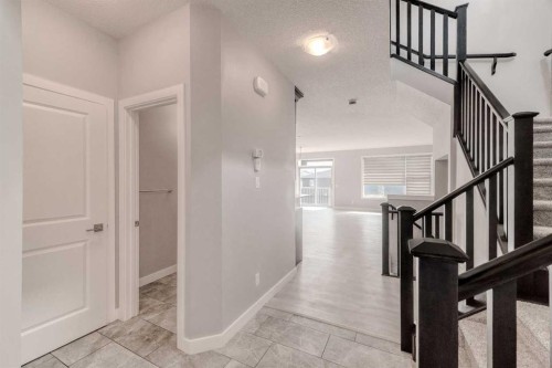 22 Sage Bluff Heights Nw, Calgary, AB - Indoor Photo Showing Other Room