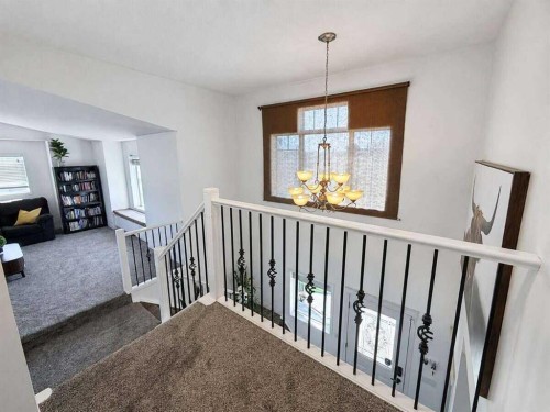 24 Brander Avenue Nw, Langdon, AB - Indoor Photo Showing Other Room