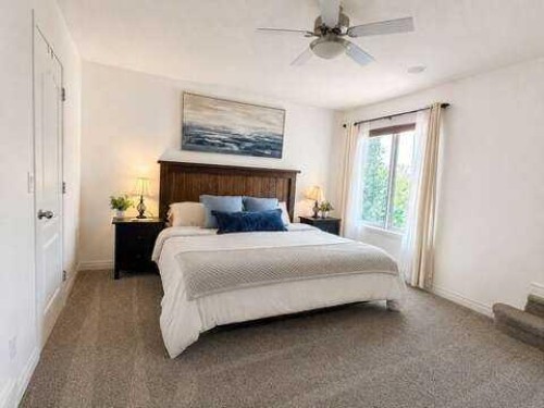 24 Brander Avenue Nw, Langdon, AB - Indoor Photo Showing Bedroom