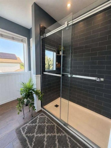 24 Brander Avenue Nw, Langdon, AB - Indoor Photo Showing Bathroom