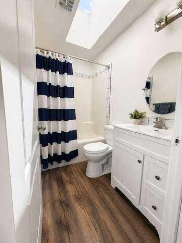 24 Brander Avenue Nw, Langdon, AB - Indoor Photo Showing Bathroom