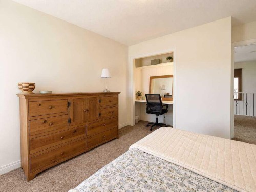 24 Brander Avenue Nw, Langdon, AB - Indoor Photo Showing Bedroom