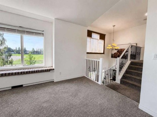 24 Brander Avenue Nw, Langdon, AB - Indoor Photo Showing Other Room