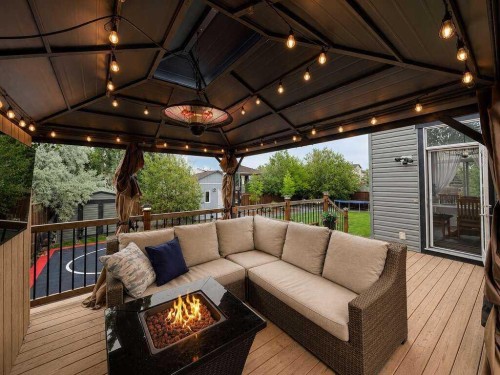 24 Brander Avenue Nw, Langdon, AB - Outdoor With Deck Patio Veranda With Exterior
