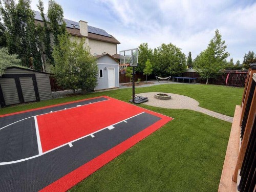 24 Brander Avenue Nw, Langdon, AB - Outdoor With Backyard