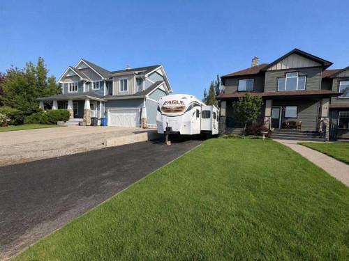 24 Brander Avenue Nw, Langdon, AB - Outdoor With Facade