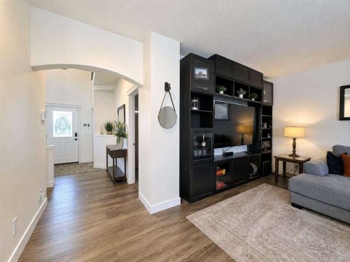 24 Brander Avenue Nw, Langdon, AB - Indoor Photo Showing Living Room