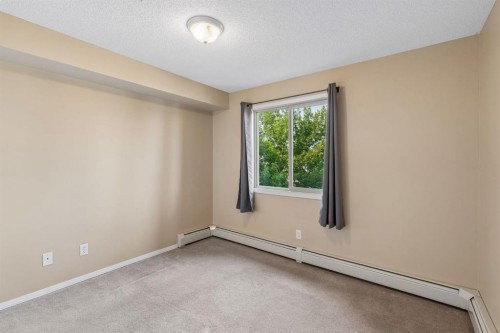 1305-8 Bridlecrest Drive Sw, Calgary, AB - Indoor Photo Showing Other Room