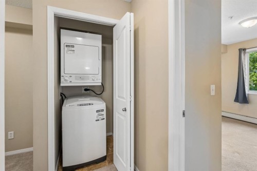 1305-8 Bridlecrest Drive Sw, Calgary, AB - Indoor Photo Showing Laundry Room