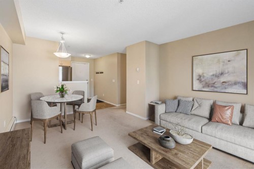 1305-8 Bridlecrest Drive Sw, Calgary, AB - Indoor Photo Showing Living Room