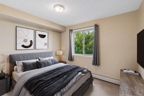 1305-8 Bridlecrest Drive Sw, Calgary, AB - Indoor Photo Showing Bedroom