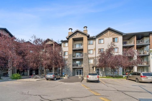 1305-8 Bridlecrest Drive Sw, Calgary, AB - Outdoor With Balcony With Facade
