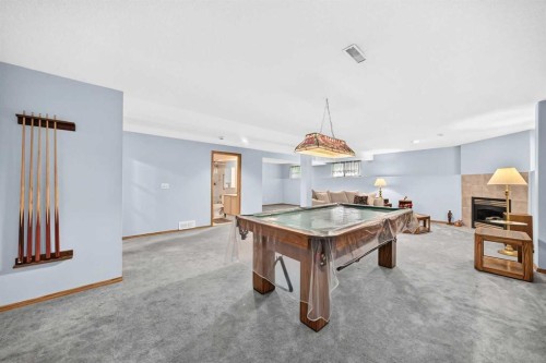 18 Shawbrooke Rise Sw, Calgary, AB - Indoor Photo Showing Other Room