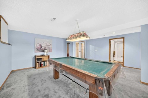 18 Shawbrooke Rise Sw, Calgary, AB - Indoor Photo Showing Other Room
