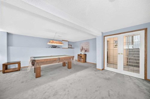 18 Shawbrooke Rise Sw, Calgary, AB - Indoor Photo Showing Other Room