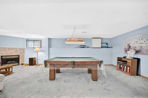 18 Shawbrooke Rise Sw, Calgary, AB - Indoor Photo Showing Other Room