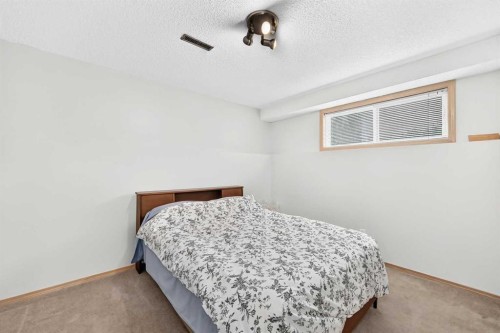 18 Shawbrooke Rise Sw, Calgary, AB - Indoor Photo Showing Bedroom
