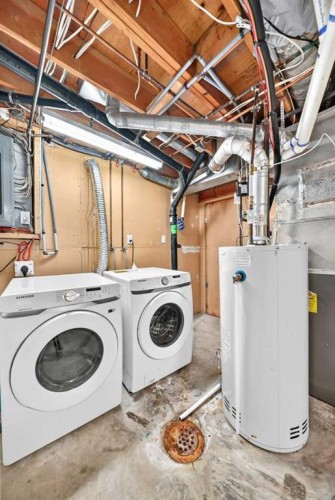 291 Falton Drive Ne, Calgary, AB - Indoor Photo Showing Laundry Room
