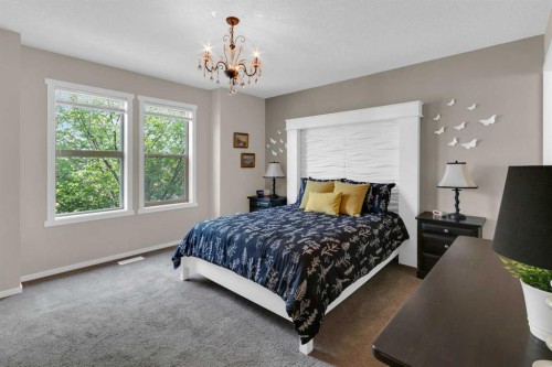 87 Marine Drive Se, Calgary, AB - Indoor Photo Showing Bedroom