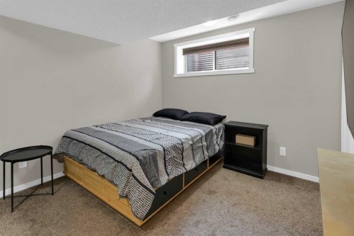 87 Marine Drive Se, Calgary, AB - Indoor Photo Showing Bedroom