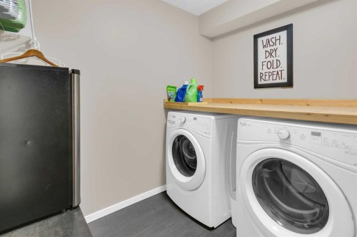 87 Marine Drive Se, Calgary, AB - Indoor Photo Showing Laundry Room