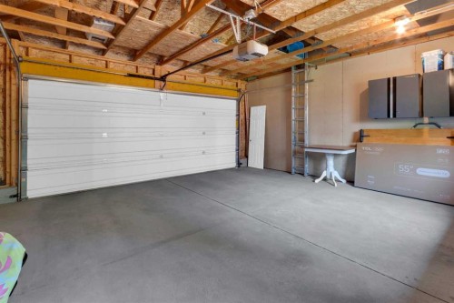 87 Marine Drive Se, Calgary, AB - Indoor Photo Showing Garage