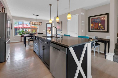87 Marine Drive Se, Calgary, AB - Indoor Photo Showing Kitchen With Double Sink With Upgraded Kitchen