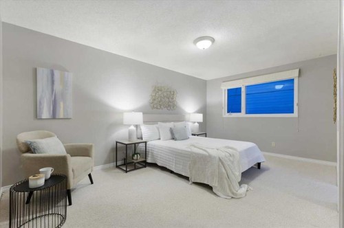 124 Oakmoor Place Sw, Calgary, AB - Indoor Photo Showing Bedroom