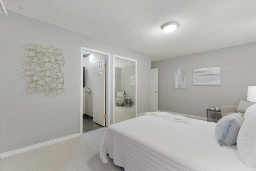 124 Oakmoor Place Sw, Calgary, AB - Indoor Photo Showing Bedroom