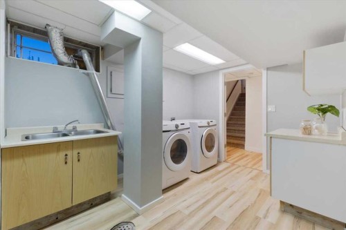 124 Oakmoor Place Sw, Calgary, AB - Indoor Photo Showing Laundry Room
