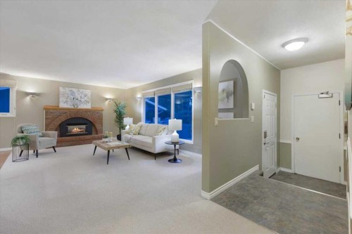 124 Oakmoor Place Sw, Calgary, AB - Indoor With Fireplace