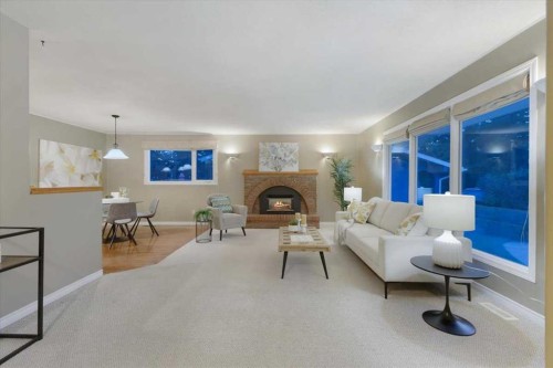 124 Oakmoor Place Sw, Calgary, AB - Indoor Photo Showing Living Room With Fireplace