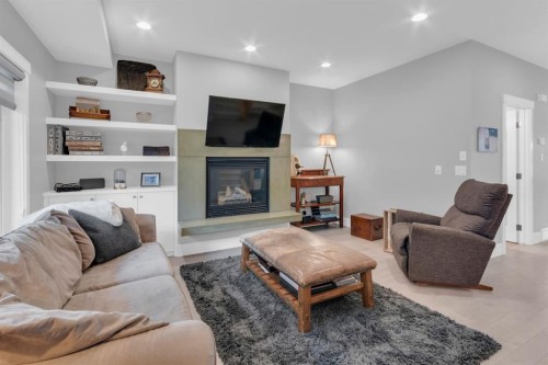 4616 82 Street Nw, Calgary, AB - Indoor Photo Showing Living Room With Fireplace