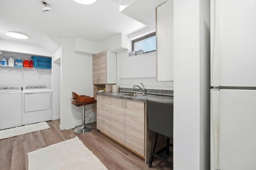 9832 Athens Road Se, Calgary, AB - Indoor Photo Showing Laundry Room