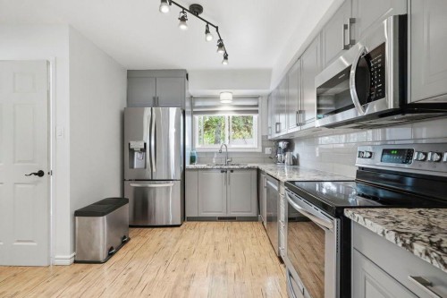 9832 Athens Road Se, Calgary, AB - Indoor Photo Showing Kitchen With Stainless Steel Kitchen