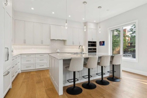 23 Elveden Park Sw, Calgary, AB - Indoor Photo Showing Kitchen With Upgraded Kitchen