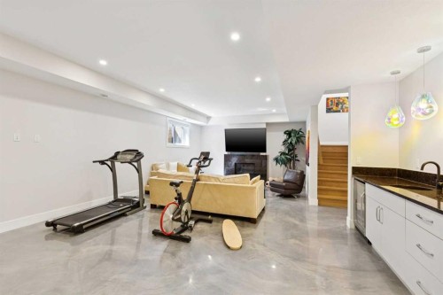23 Elveden Park Sw, Calgary, AB - Indoor Photo Showing Gym Room