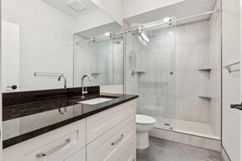 23 Elveden Park Sw, Calgary, AB - Indoor Photo Showing Bathroom