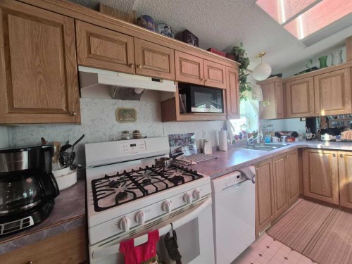 34280 Range Road 41, Rural Mountain View County, AB - Indoor Photo Showing Kitchen