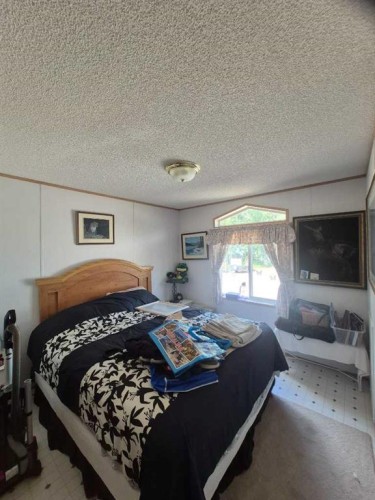 34280 Range Road 41, Rural Mountain View County, AB - Indoor Photo Showing Bedroom
