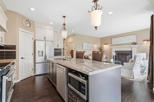 160 Brightoncrest Manor Se, Calgary, AB - Indoor Photo Showing Kitchen With Fireplace With Upgraded Kitchen