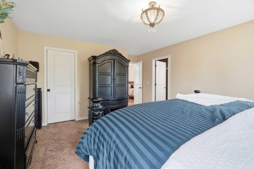 160 Brightoncrest Manor Se, Calgary, AB - Indoor Photo Showing Bedroom