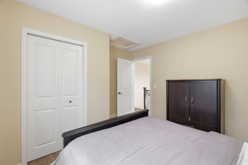 160 Brightoncrest Manor Se, Calgary, AB - Indoor Photo Showing Bedroom
