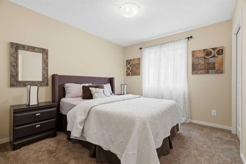 160 Brightoncrest Manor Se, Calgary, AB - Indoor Photo Showing Bedroom