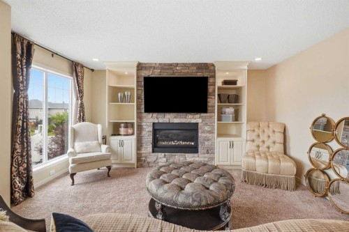 160 Brightoncrest Manor Se, Calgary, AB - Indoor Photo Showing Living Room With Fireplace